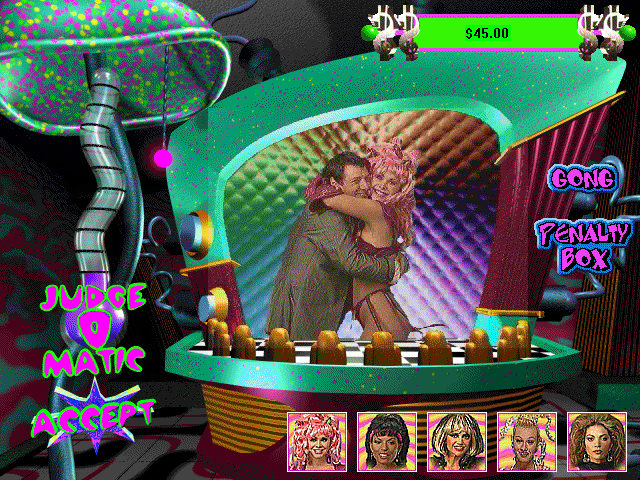 Ms. Metaverse (Windows) screenshot: Talent contest: Again video clips, this time of various strange skills or dances. Rhonda Roadmaster (Melissa Holiday) hugs Monty Megabyte.