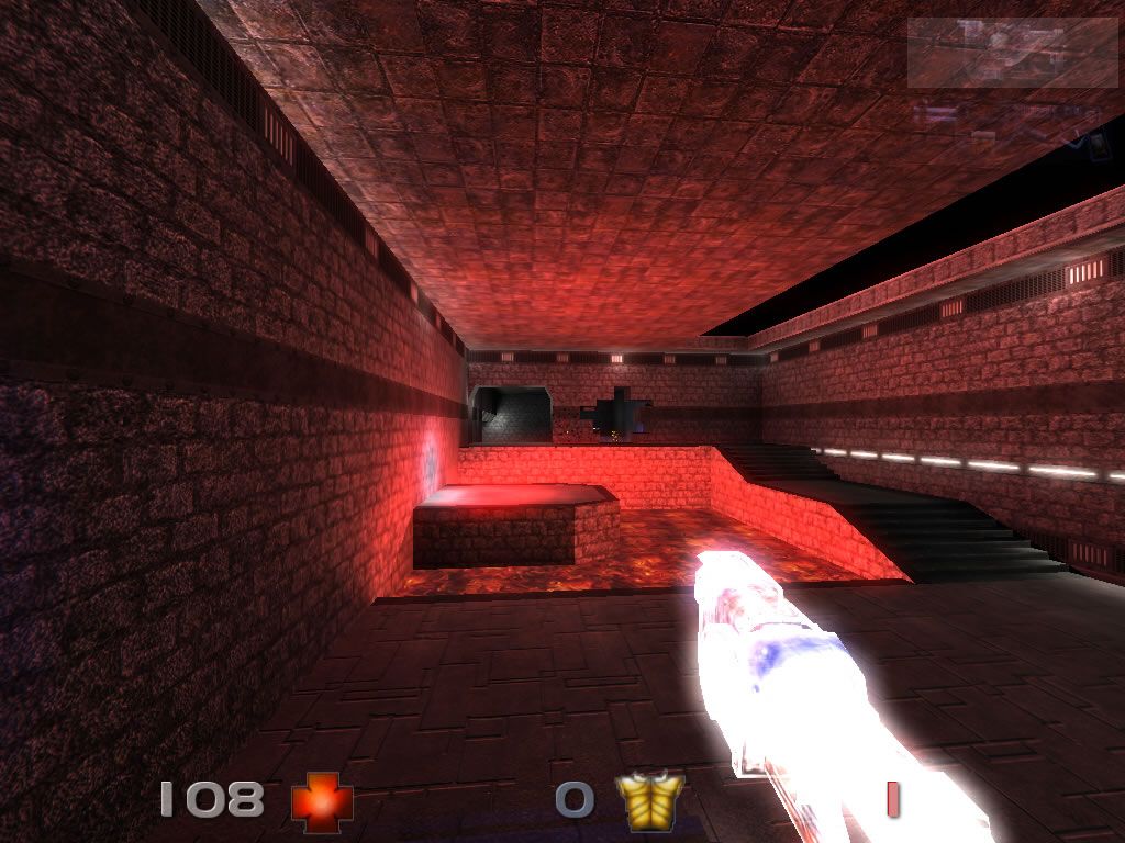 Nexuiz (Windows) screenshot: Lava pit, I've just picked up a power-up that increases my firepower.