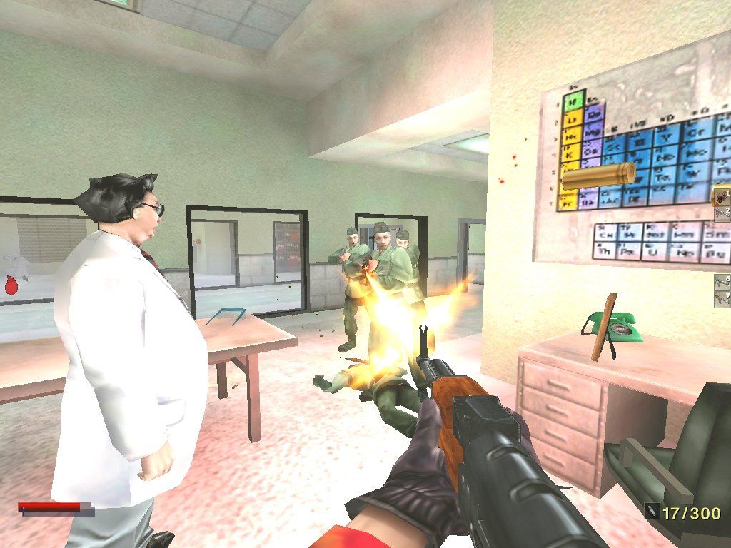 The Operative: No One Lives Forever (Windows) screenshot: Cate mows down a goodly portion of the Soviet army while busting defector Dr. Otto Schenker out of an East German labratory