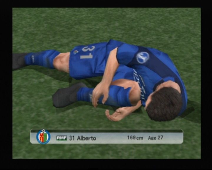 World Soccer: Winning Eleven 9 (PlayStation 2) screenshot: That's gotta hurt... no, he's getting up and continuing the game, the injure appears to be mild