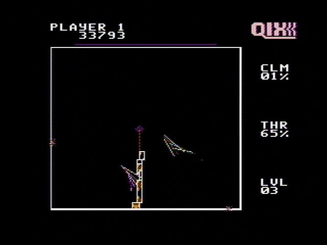 QIX (NES) screenshot: Can you split two Qix?