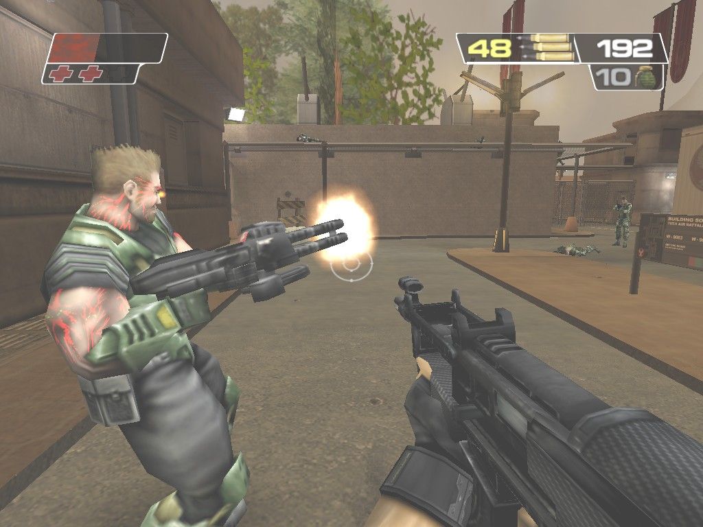 Red Faction II (Windows) screenshot: Repta, your squad's heavy weapons guy, is truely the ultimate destructive force. With a heavy machinegun and almost perfect aim, he can easily decimate Sopot's soldiers without breaking a sweat