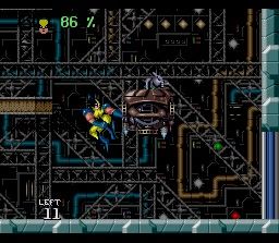 Wolverine: Adamantium Rage (SNES) screenshot: Jump-kicking the flying robot dispenser