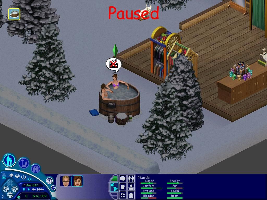 The Sims: Vacation (Windows) screenshot: Relaxing in the hot tub on a cold, winter night.