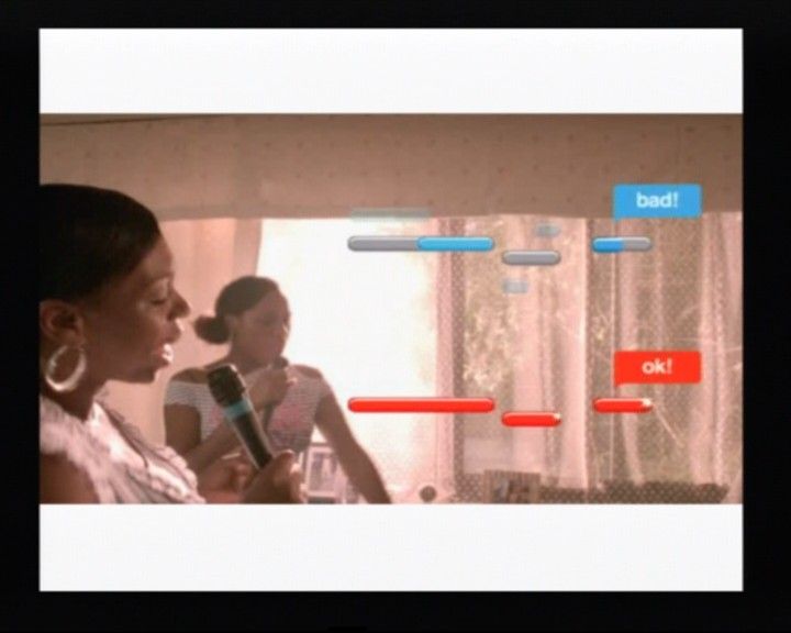 SingStar: Party (PlayStation 2) screenshot: Opening video shows some people having fun with the game and how it all works