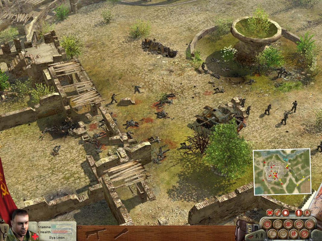 Soldiers: Heroes of World War II (Windows) screenshot: An Alamo situation that three Russians have fought their way out of, leaving behind bodies and burned out vehicles.