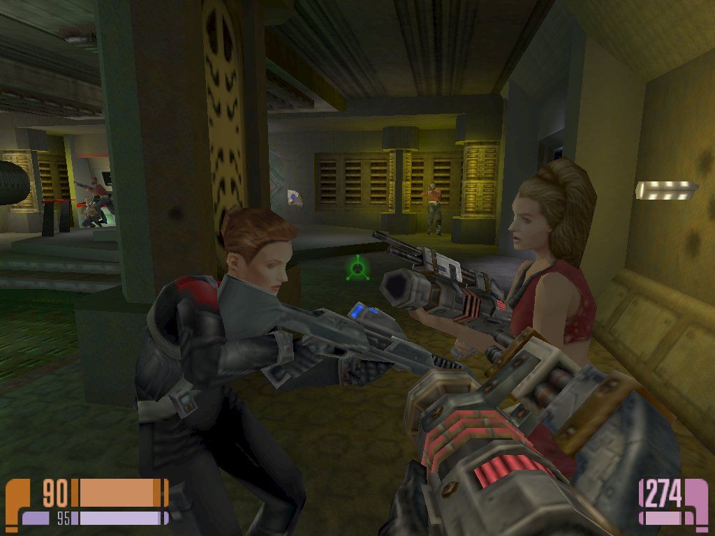 Star Trek: Voyager - Elite Force (Collector's Edition) (Windows) screenshot: Cool! Cat fight between Telsia and an Imperial Bridge Bunny aboard the Scavenger ship