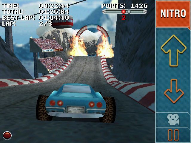 Stuntcar Extreme Advanced (Windows Mobile) screenshot: Approaching a ring of fire on Rollercoaster track