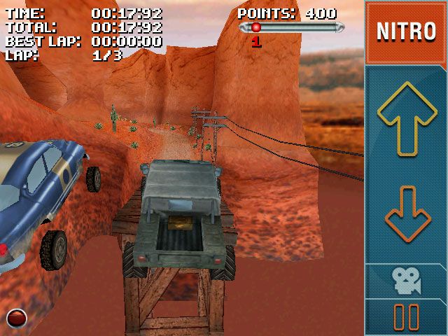 Stuntcar Extreme Advanced (Windows Mobile) screenshot: Stunt Saber and Sherman cars jumping on GC Stunt Tour track