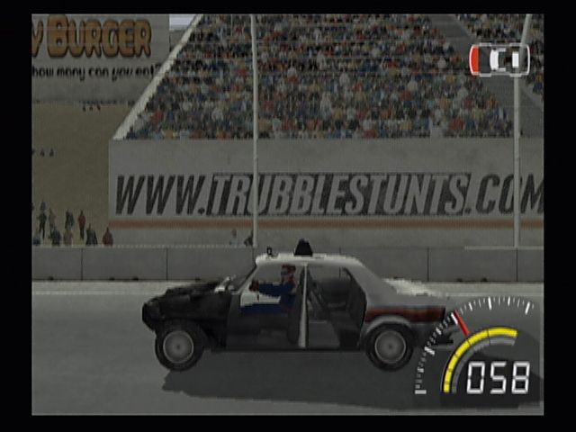 Stuntman (PlayStation 2) screenshot: You'd think they'd buy the constables better cars. Cars take damage and everything from panels to wheels can come off.
