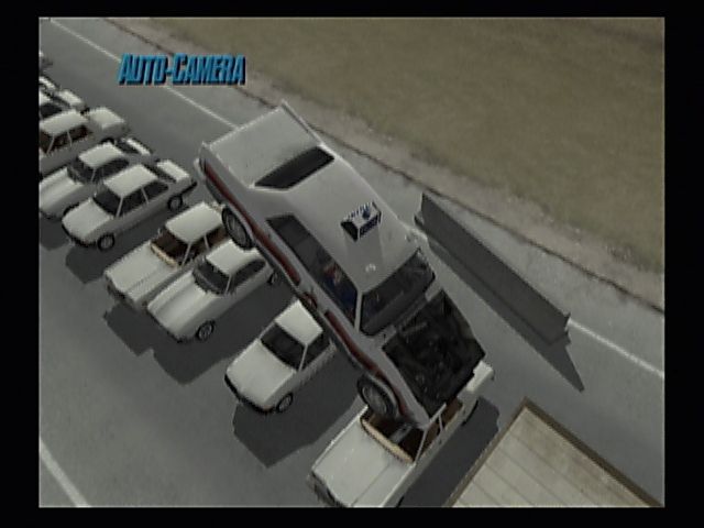 Stuntman (PlayStation 2) screenshot: Below the law. The arena mode allows for jumps over various cars and schoolbuses among the various stunts.