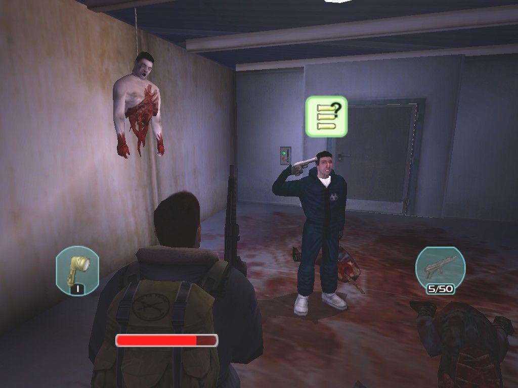 The Thing (Windows) screenshot: Powell expresses his displeasure with all the ripped up gory bodies by blowing his own brains out. Guess the guy's not a big System Shock 2 fan