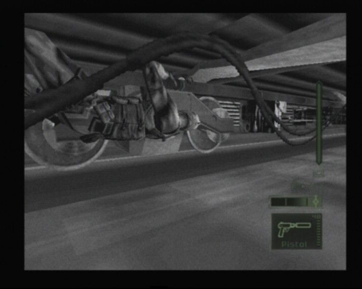 Tom Clancy's Splinter Cell: Pandora Tomorrow (PlayStation 2) screenshot: Under the speeding train, what all Sam won't do just to evade being spotted