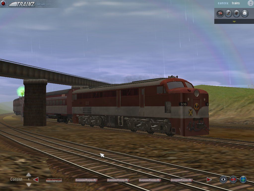 Trainz: Virtual Railroading on your PC (Windows) screenshot: Racing for Gold. The drizzle may be bothersome, but it did produce a nice rainbow.