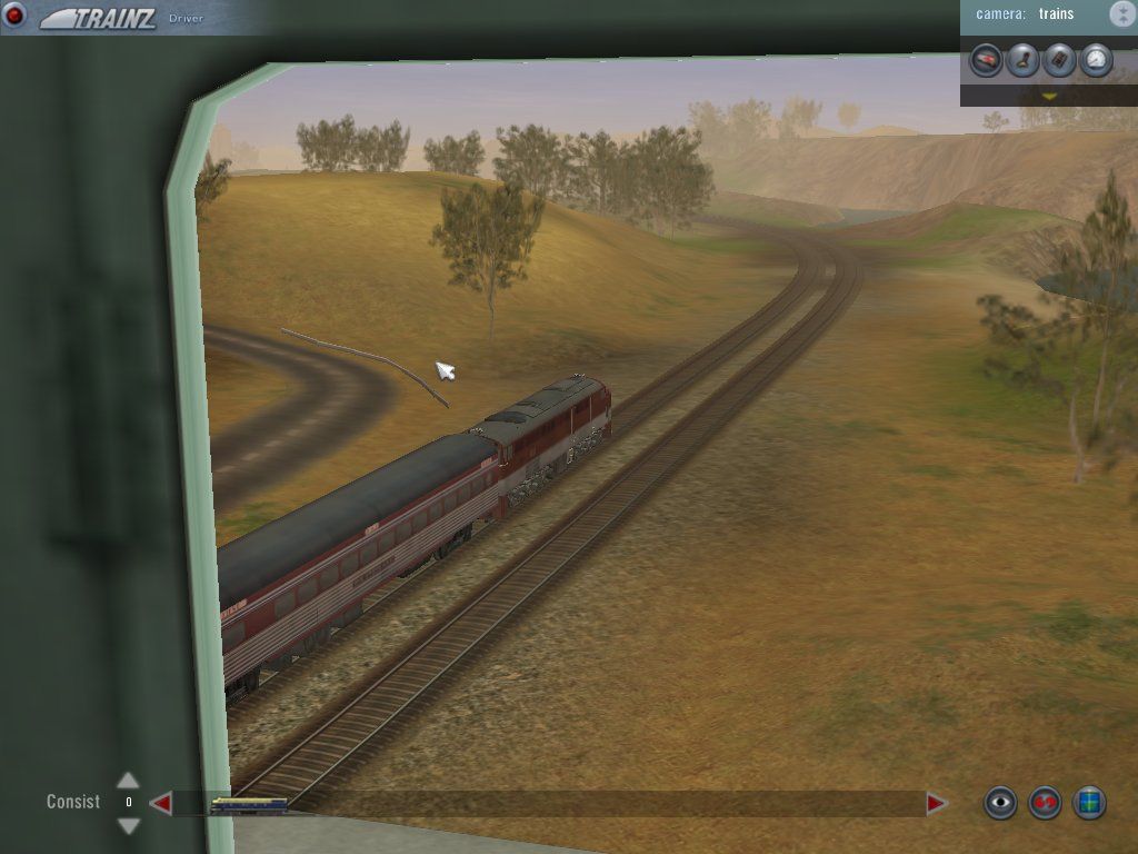 Trainz: Virtual Railroading on your PC (Windows) screenshot: Right on schedule. Looking out the side of the cab, an Australian driver catches a glimpse of a train running on the tracks below.