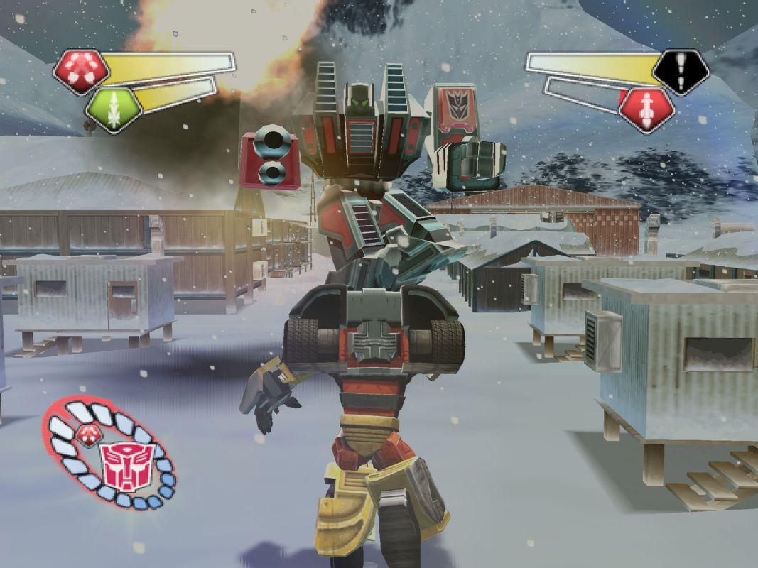 TransFormers (PlayStation 2) screenshot: Hot Shot battling a Heavy Unit among the buildings of the Research Base in Antarctica.