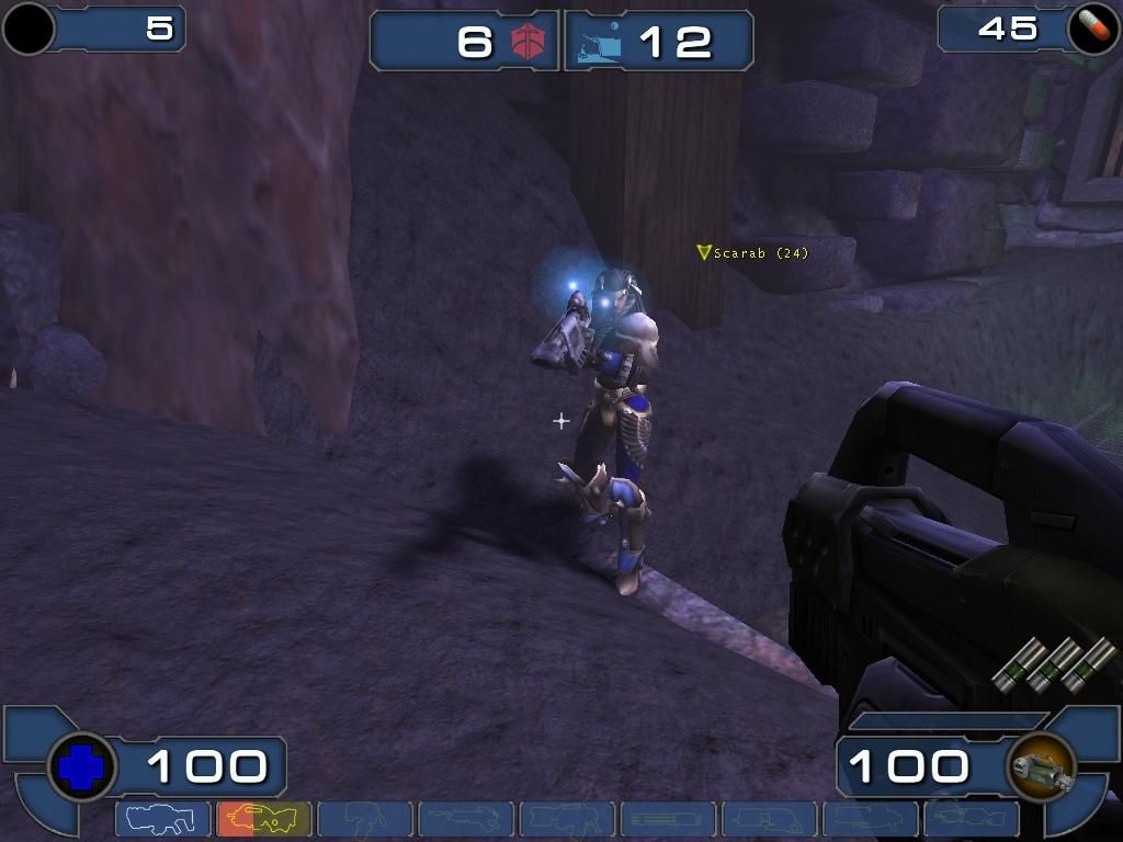 Unreal Tournament 2003 (Windows) screenshot: Scarab, one of the single player bots, is following me.