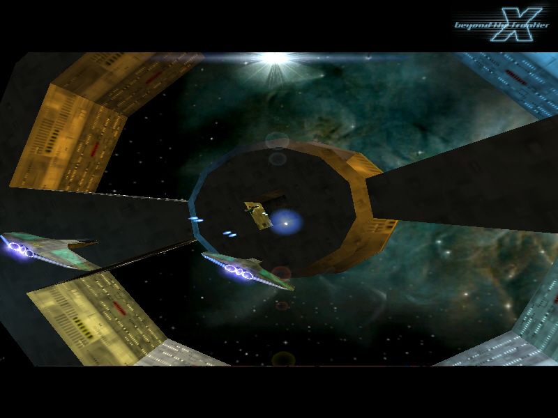 X: Beyond the Frontier (Windows) screenshot: Also from the "credits section"; fighters attacking a space station