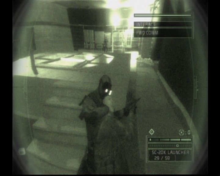 Tom Clancy's Splinter Cell: Chaos Theory (Xbox) screenshot: Sam now has a knife for silent attacks, and while holding a target you can decide to kill or just render the guard unconscious.