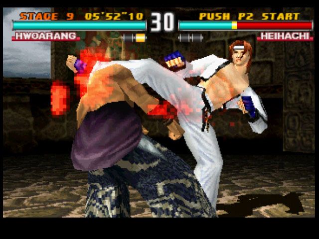 Tekken 3 (PlayStation) screenshot: One of Hwoarang's standard close combat attacks - looks painful!