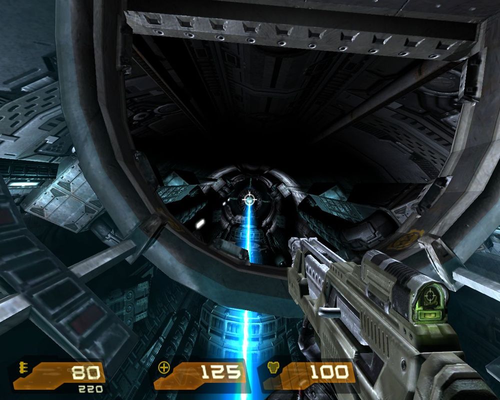 Quake 4 (Windows) screenshot: Using an elevator in a Strogg tower