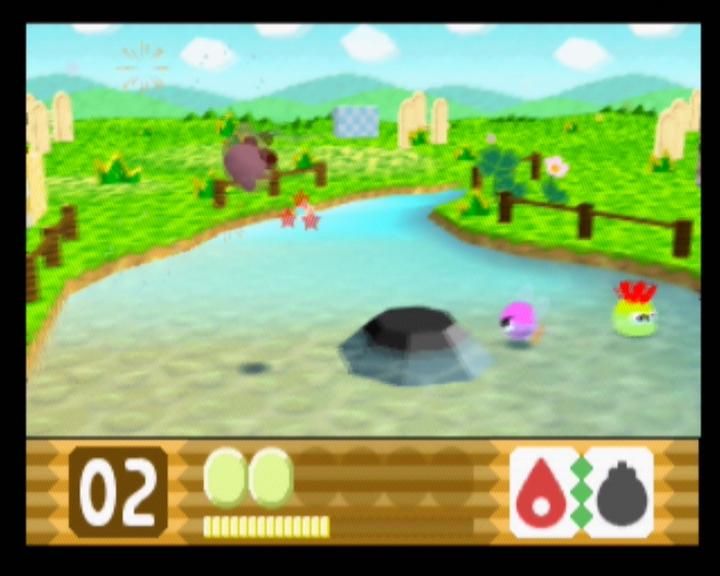 Kirby 64: The Crystal Shards (Nintendo 64) screenshot: The black obstacle in the water can be destroyed with any Bomb powerup