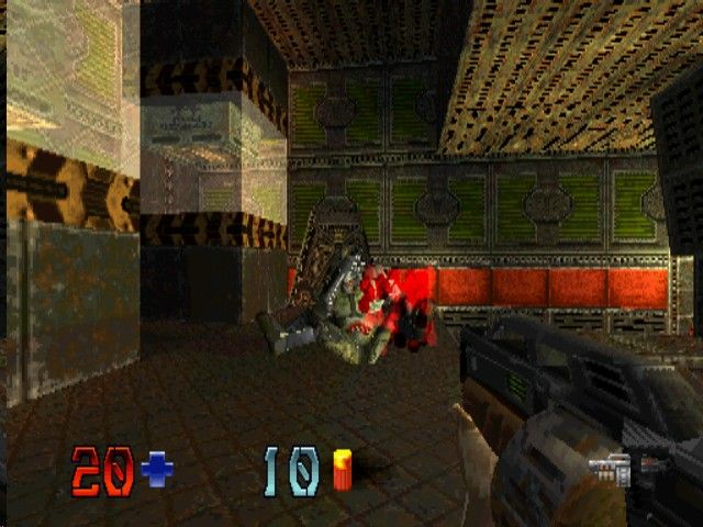 Quake II (PlayStation) screenshot: Shotgunning a light guard in Outer Base