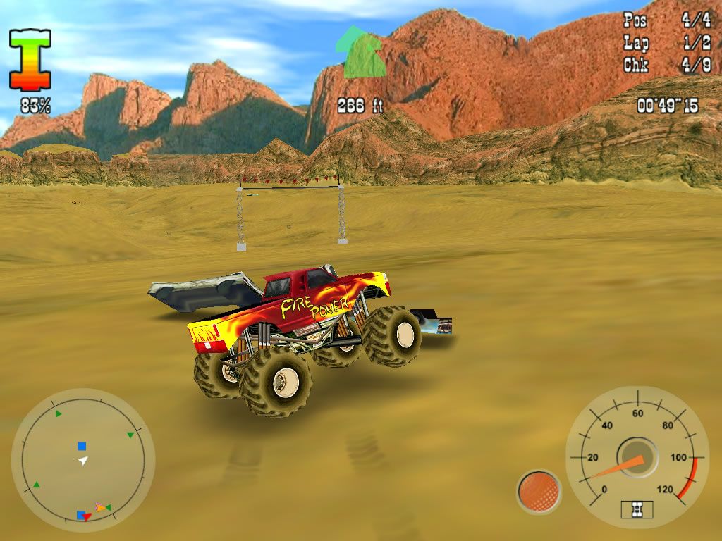 Monster Truck Rumble (Windows) screenshot: Messing with some car wrecks on a desert track.