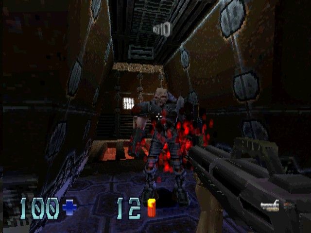 Quake II (PlayStation) screenshot: Giving a gunner both barrels from attract mode