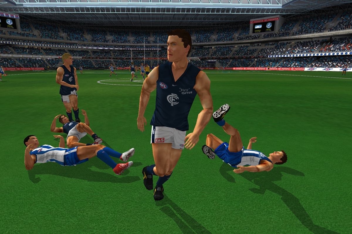 AFL Premiership 2006 (PlayStation 2) screenshot: Carlton player avoids collision.