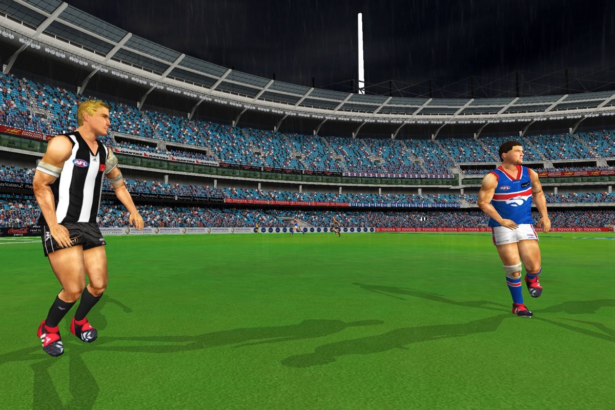 AFL Premiership 2006 (PlayStation 2) screenshot: Collingwood and Bulldogs players prepare for mark.