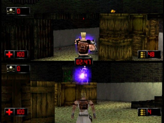 Duke Nukem: Time to Kill (PlayStation) screenshot: Toga Duke vs. Commando Duke in factory