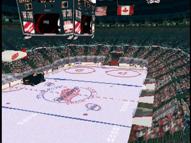 NHL FaceOff '99 (PlayStation) screenshot: The zamboni takes to the ice between periods.