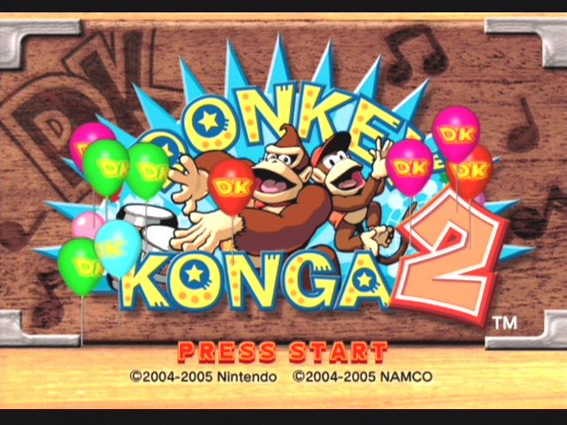 Donkey Konga 2 (GameCube) screenshot: Title Screen - clap and balloons appear.