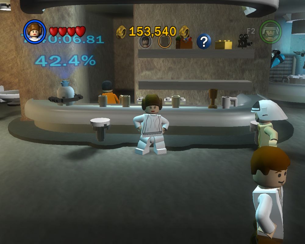 LEGO Star Wars II: The Original Trilogy (Windows) screenshot: Mos Eisley Cantina. Here, you can buy hints, characters and special features which can help you through the game.