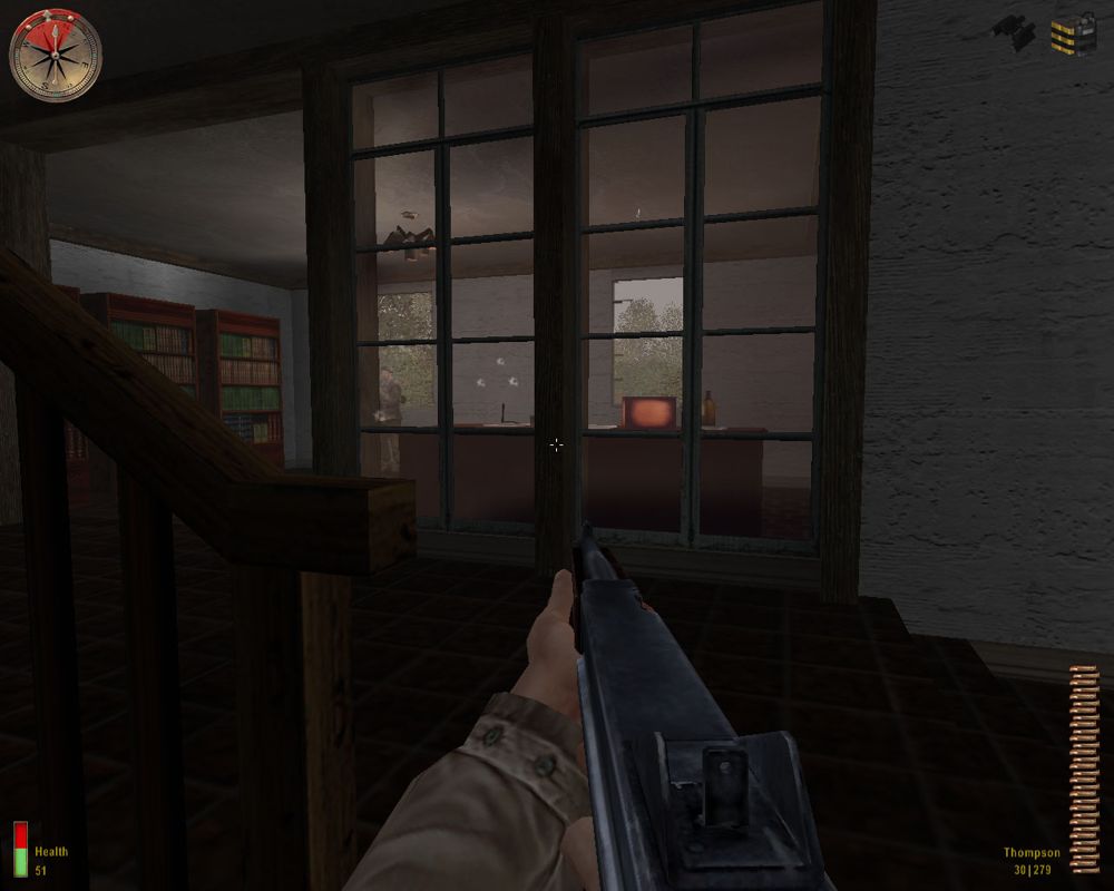 Medal of Honor: Allied Assault (Windows) screenshot: Fighting inside a house, jerrys hiding behind the desk