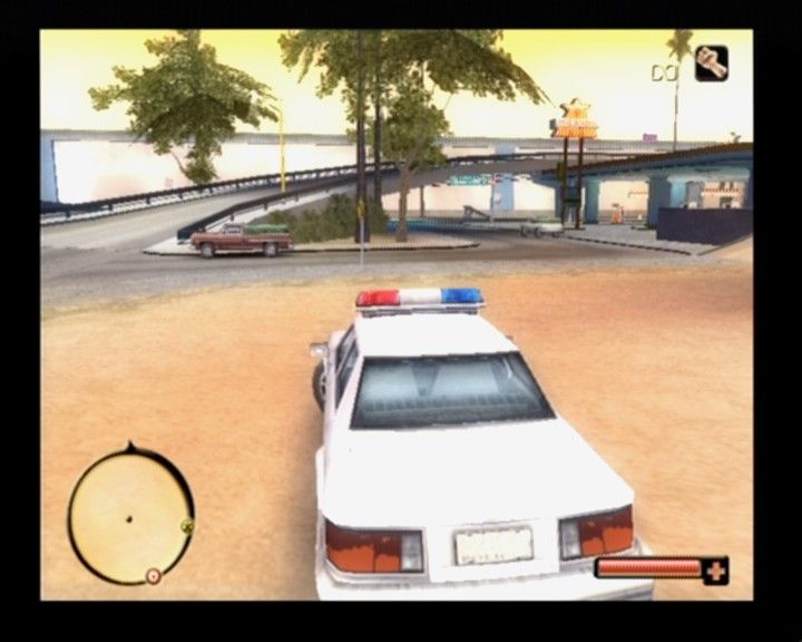 Total Overdose: A Gunslinger's Tale in Mexico (PlayStation 2) screenshot: Driving a stolen... err, borrowed police car