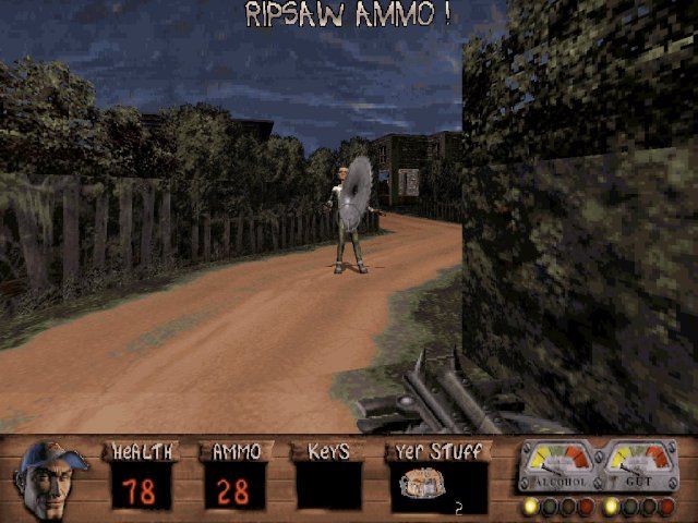 Redneck Rampage: Suckin' Grits on Route 66 (DOS) screenshot: Buzz saw weapon