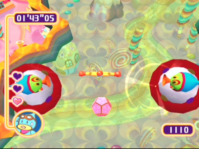 Kururin Squash! (GameCube) screenshot: These flying saucers require multiple hits to defeat