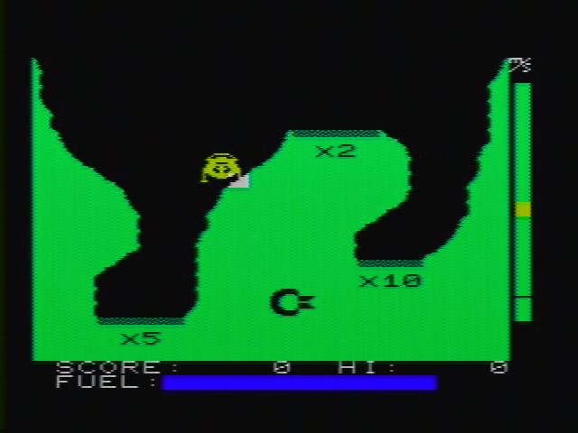 Jupiter Lander (VIC-20) screenshot: Oh no! That mountain just jumped out in front of me. Thats going to scratch the fresh paint job.