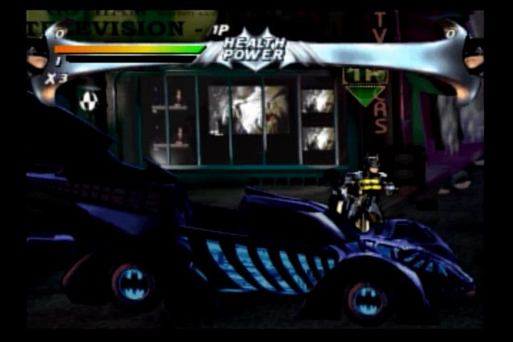 Batman Forever (SEGA Saturn) screenshot: Making an entrance with the Batmobile