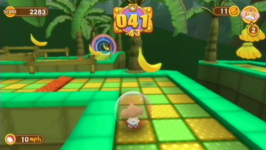 Super Monkey Ball: Banana Blitz (Wii) screenshot: Those red bumps will mess you up.