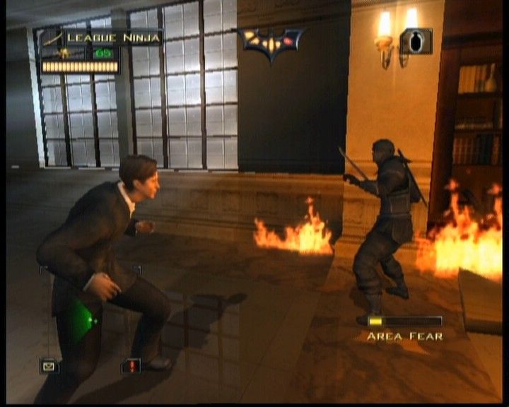 Batman Begins (Xbox) screenshot: One on one with armed ninja... should be no threat to deal with.
