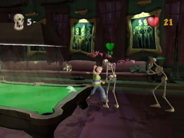 Grabbed by the Ghoulies (Xbox) screenshot: You can even grab the pool table and swing that around.