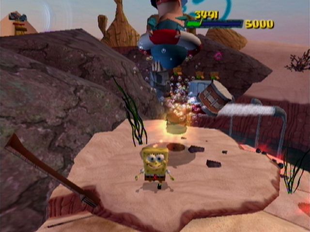The SpongeBob SquarePants Movie (Xbox) screenshot: Uppercut these flying enemies underneath to hurt them.
