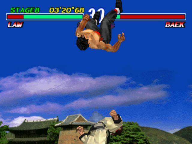 Tekken 2 (PlayStation) screenshot: Close combat attacks are shown from different angles.