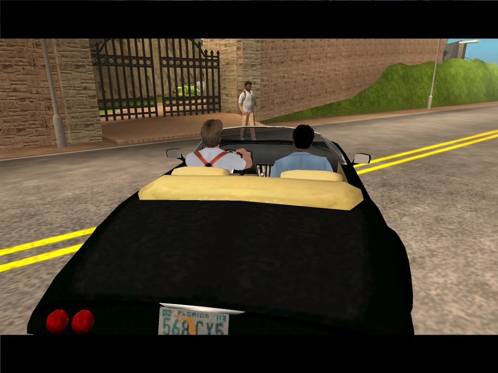Miami Vice (Windows) screenshot: Crockett and Tubbs arrive in their cool car.