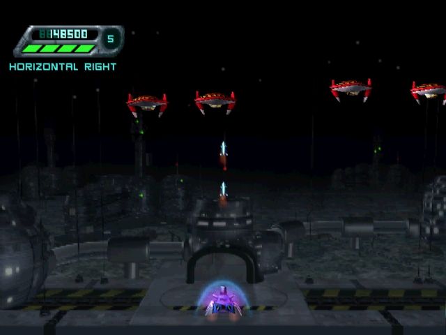 Space Invaders (PlayStation) screenshot: Destroy the motherships and earn some extra points.