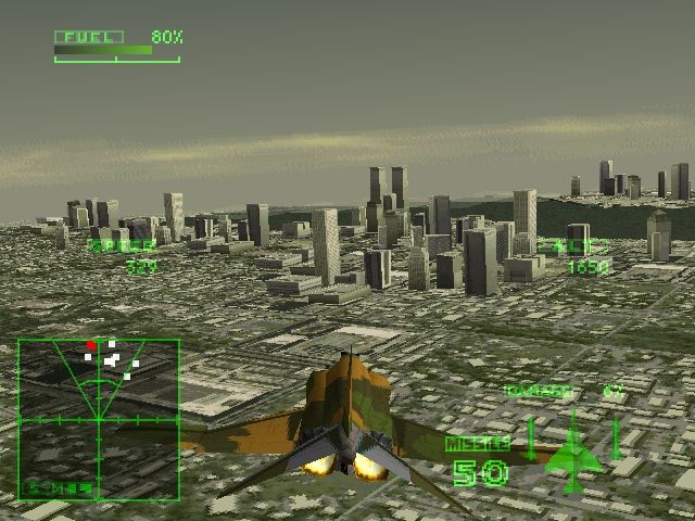 Ace Combat 2 (PlayStation) screenshot: Some ground targets are hidden between the buildings.