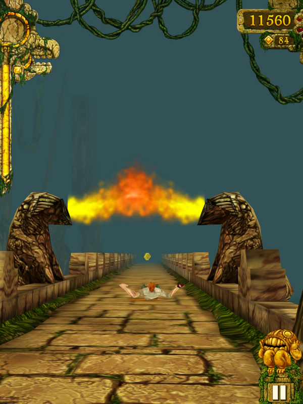 Temple Run (iPad) screenshot: Slide under fire gates!